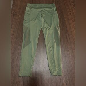 Olive Green Athletic Leggings With Mesh Panels And Size Pockets Size M.